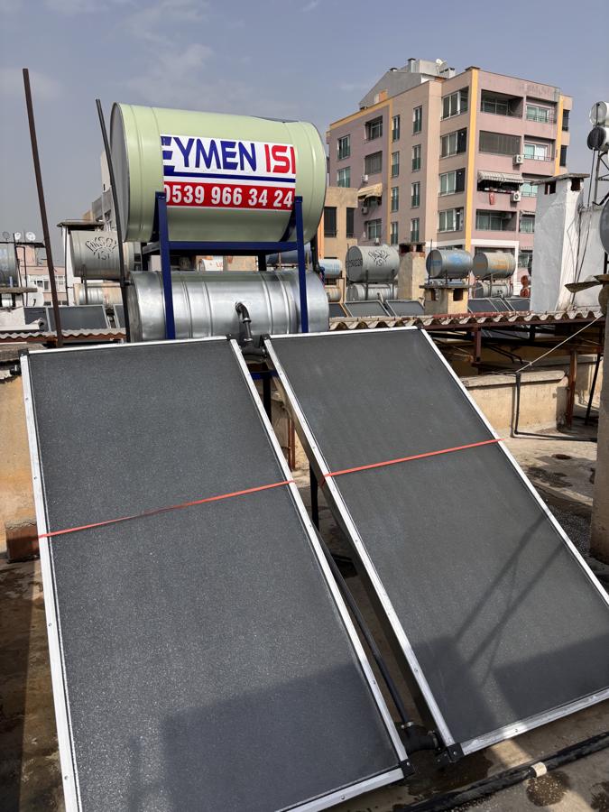 Teras çatıya kurulan düz kollektörlü güneş enerjisi sistemi ve depo